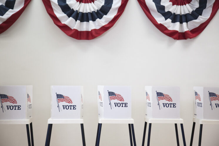 This image has an empty alt attribute; its file name is Voting-booths-GettyImages.138711481.super_-745x497.jpg